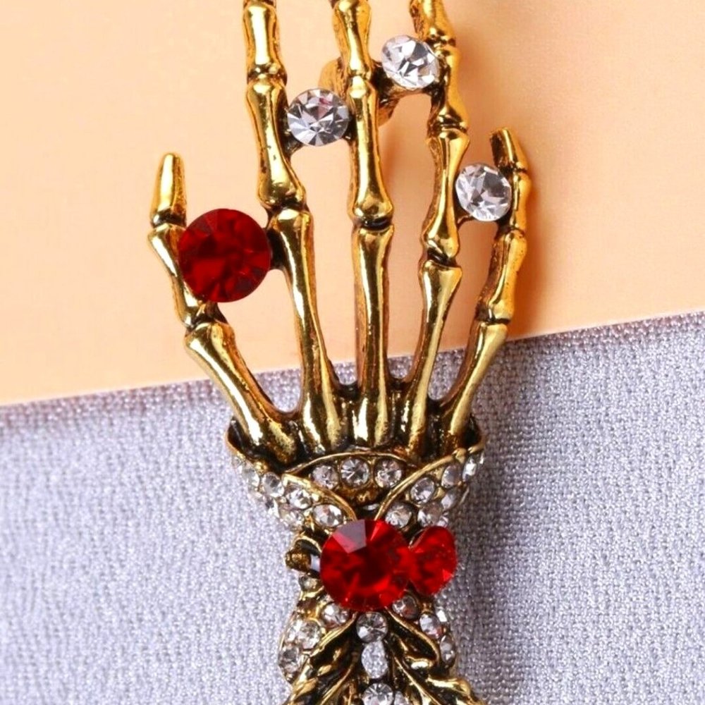 Betsey Johnson Rare! Gold Skeleton Hand Brooch with Red and Silver Accents